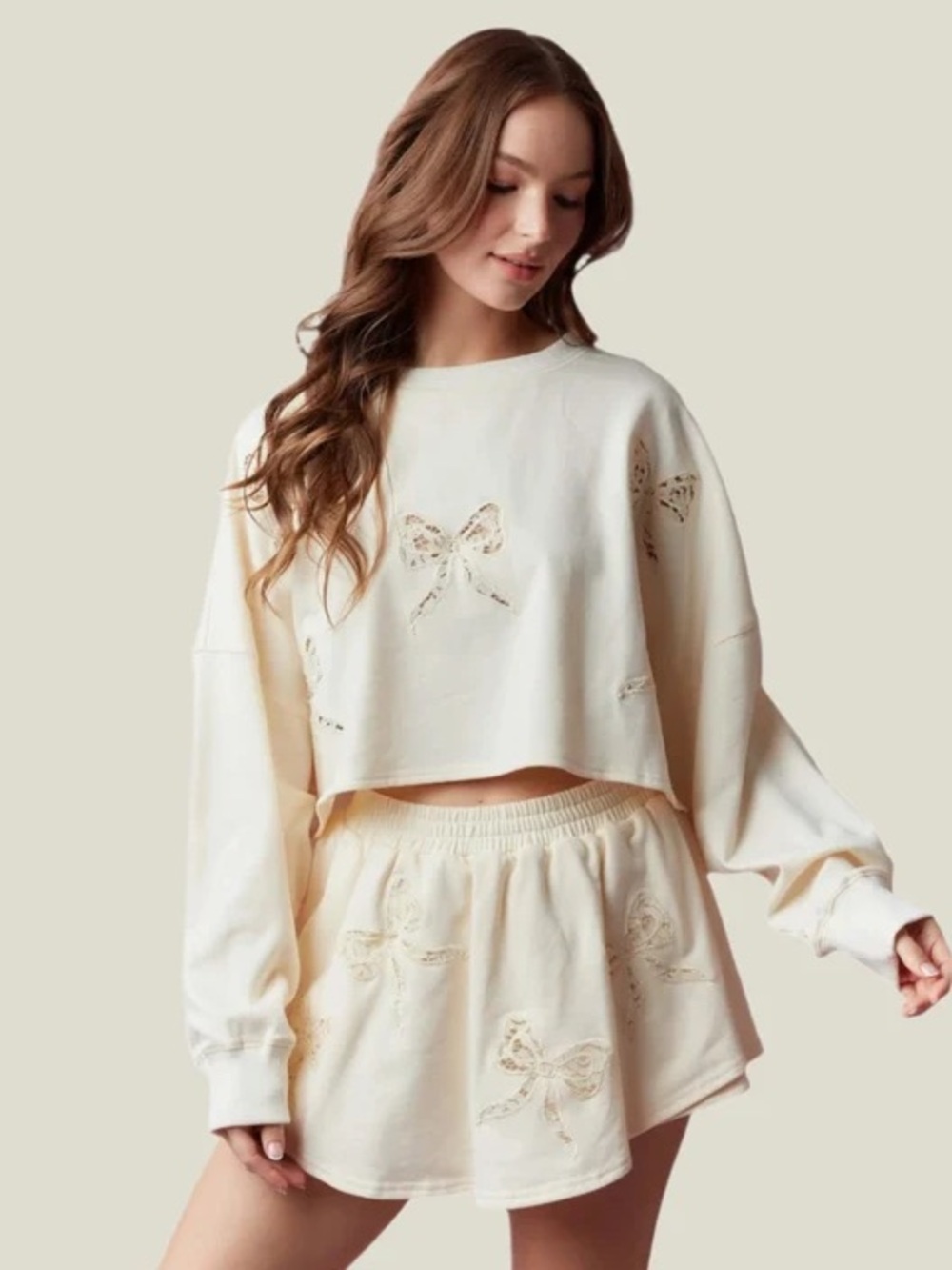 261 • Peach Love California Cream Bow Cutout Pullover